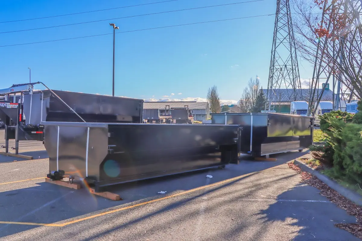 Roll-off dumpster ready for waste disposal at job site for 15 Yard Dumpster Rental in East Windsor